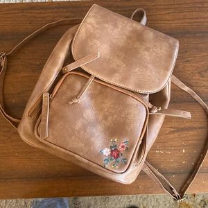 Brand new faux leather backpack with floral stitching tan never used